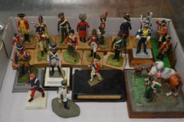 A collection of miniature military figures.