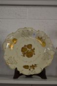 A Dresden gilt decorated dish.