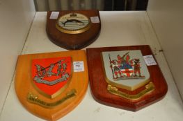 Three military plaques.