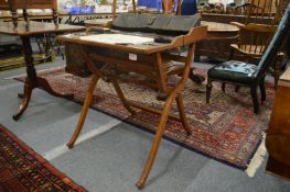An Edwardian oak folding/travelling desk with fitted leather interior.