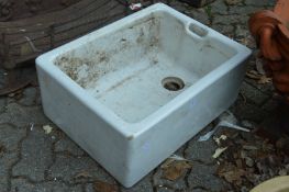 A porcelain butlers sink.