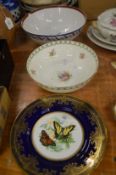 A cabinet plate decorated with butterflies, a Doulton floral decorated bowl and a Samson bowl.