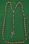 A rosary bead necklace.