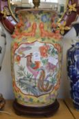 A large Chinese vase lamp.