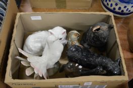 A porcelain model of a dove and other items.