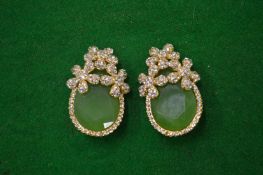 A pair of decorative ear clips.