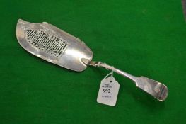 A silver fish slice.