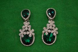 A pair of decorative ear clips.