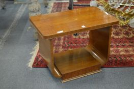 An art deco walnut two tier occasional table.
