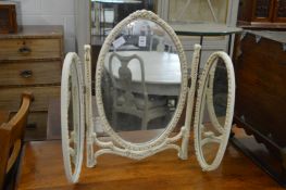 A dressing table mirror.
