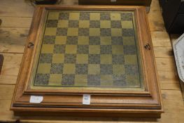 A chess board containing chess pieces.