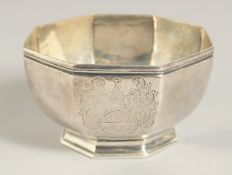 A GOOD GEORGE 1ST OCTAGONAL SILVER BOWL, 4.25ins diameter, 2.5ins high with period crest