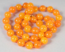 A GOOD SMALL AMBER BEAD NECKLACE, 15ins long, 42 beads. 16gms.