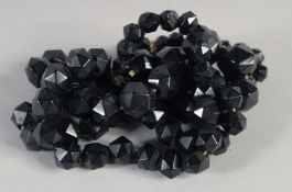 A WHITBY JET GRADUATED BEAD NECKLACE. 32ins long, 69gms.