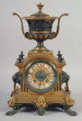 A 19TH CENTURY FRENCH ORMLOU AND GILT METAL CLOCK with urn finial, striking on a single bell,