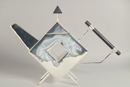 A LARGE CHRISTOPHER DRESSER DESIGN SILVER PLATED SQUARE, WITH HOLE, TEA POT.