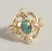 A GOOD 9CT GOLD BLACK OPAL AND DIAMOND RING.