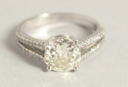 A SUPERB 18CT WHITE GOLD SINGLE STONE DIAMOND RING. 2.24 carat, old cut diamond.