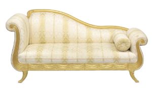 A REGENCY STYLE GILTWOOD CHAISE LOUNGE upholstered with a classical cream ground fabric. 6ft 6ins