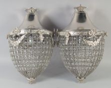 A PAIR OF GLASS ACORN SHAPED HANGING LIGHTS. 1ft 7ins high.
