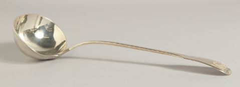 A LARGE GEORGE IV SILVER SOUP LADEL with fiddle pattern and shell handle. London 1829. Maker: