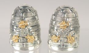 A PAIR OF BULLDOG SALT AND PEPPERS. 1.5ins high.