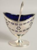 A GOOD GEORGE III SILVER BOAT SHAPED PIERCED AND ENGRAVED PEDESTAL SWEETMEAT BASKET with swing