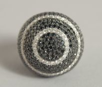 A SUPERB 18CT WHITE GOLD BLACK AND WHITE DIAMOND COCKTAIL RING, Approx. 10 carats of diamonds.
