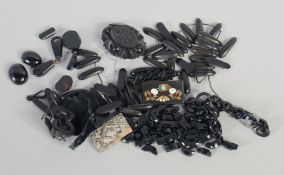 A VICTORIAN CARVED JET BROOCH, A NECK CHAIN, ETC.