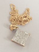 A 9CT GOLD DIAMOND SET PENDANT AND CHAIN.