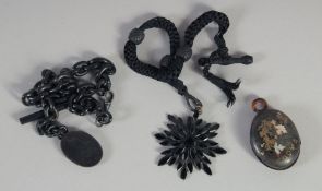 A JET FOB CHAIN, PENDANT AND TORTOISESHELL LOCKET. (3).