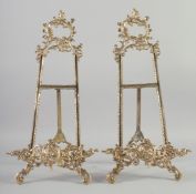 A PAIR OF BRASS EASELS. 22ins long.