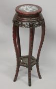 A CHINESE REDWOOD AND MARBLE TOP JARDINIERE STAND. 2ft 8ins x 10ins.
