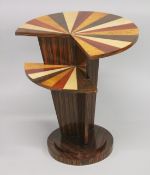 A STYLISH ART DECO STYLE SEGMENTED INLAID TWO TIER TABLE. 1ft 11.5ins x 2ft 2ins high.