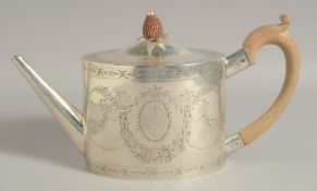 A GEORGE III SILVER OVAL TEA POT with engraved decoration and cres. London 1785. Intaglio mark,