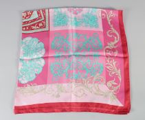 A VERSACE PINK, RED AND BLUE SCARF. 180cm x 180cm.