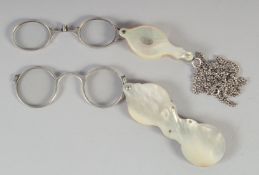 TWO VICTORIAN MOTHER OF PEARL FOLDING SPECTACLES.