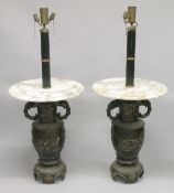 AN UNUSUAL PAIR OF JAPANESE BRONZE AND MARBLE LAMP TABLES, the bases modelled as decorative urns