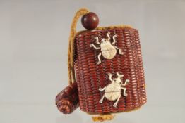 A FOUR DIVISION HARDWOOD AND BONE INRO with insects, with rope. 2.75ins.