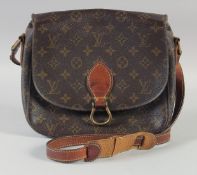 A 1960's - 1970's LOUIS VUITTON LEATHER SHOULDER BAG. 22cm x 25cm with long leather straps.