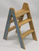 A NOVELTY PINE STEP LADDER. 2ft 8 ins high.