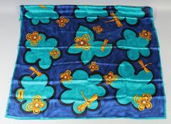 AN YVES SAINT LAURENT BLUE SILK SCARF with dragonflies. 86cm x 86cm.