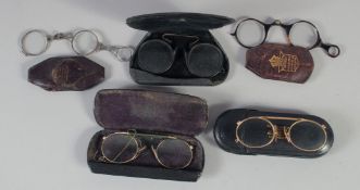 FIVE VARIOUS SPECTACLES in leather cases.