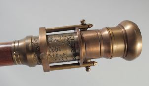 A WALKING STICK with carved bone compass handle.