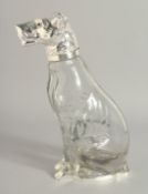 A SILVER PLATED DOG CLARET JUG. 9.5ins high.