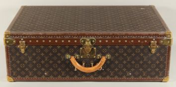 A LARGE LOUIS VUITTON SUITCASE. No. 1068754. With Louis Vuitton label. Lock no. 1262082. 31.5ins