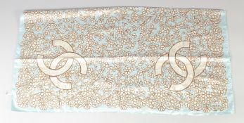 A LARGE CHANEL DOUBLE C SILK SCARF. 96cm x 94cm.