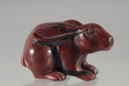 A CARVED WOOD NETSUKE, RABBIT 2.5ind , signed.