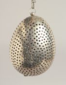 A LARGE GEORGE III SILVER TEA INFUSER with lion crest. 2.75ins x 2ins.