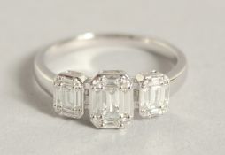 A VERY GOOD 18CT GOLD AND DIAMOND RING COMPRISING OF THREE CLUSTERS OF BAGUETTE AND ROSE CUT DIAMON